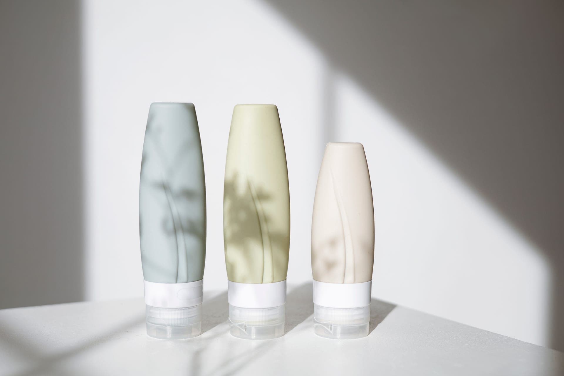 Soft daylight across a minimalist skincare still life